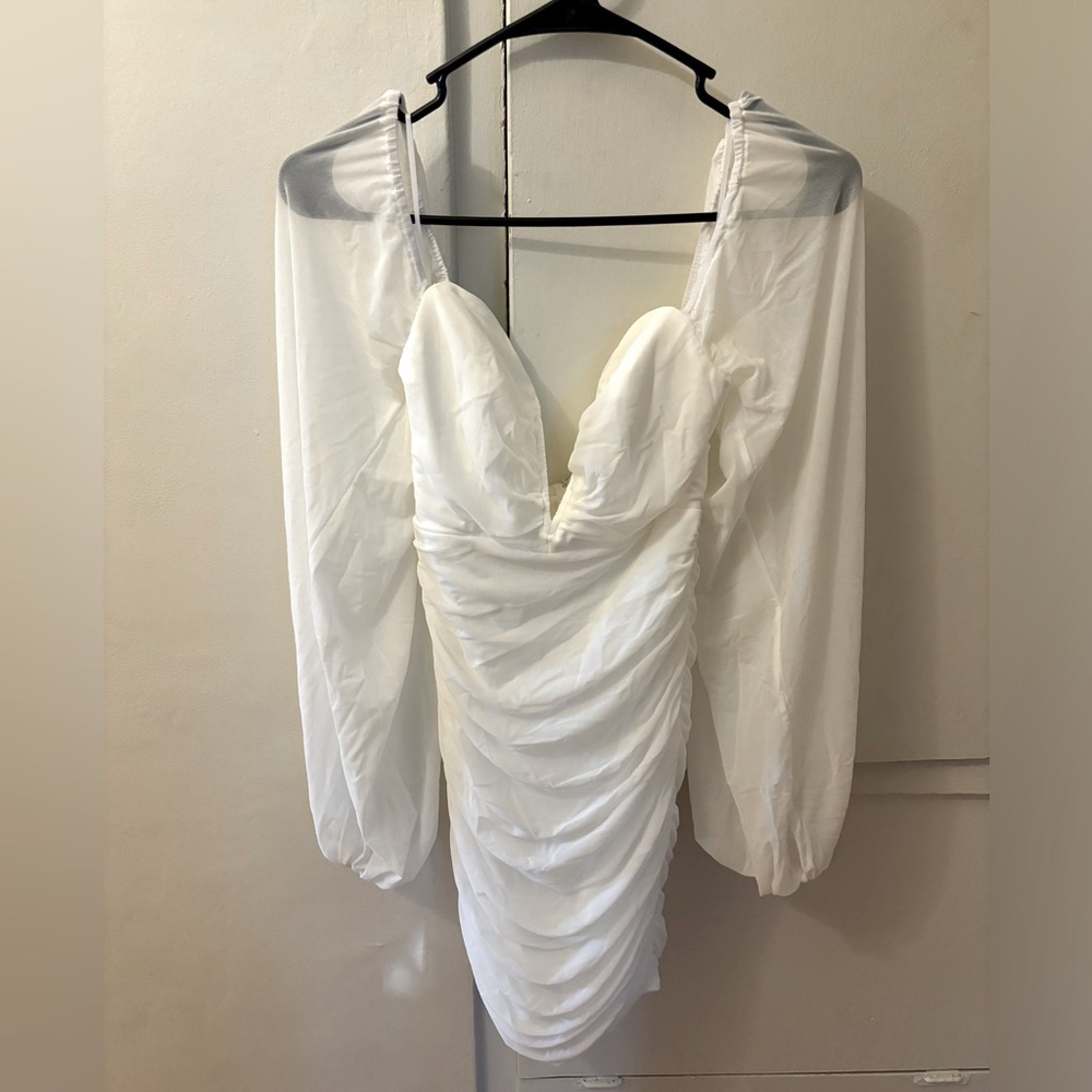 12th Tribe women’s white mini dress. Size medium.